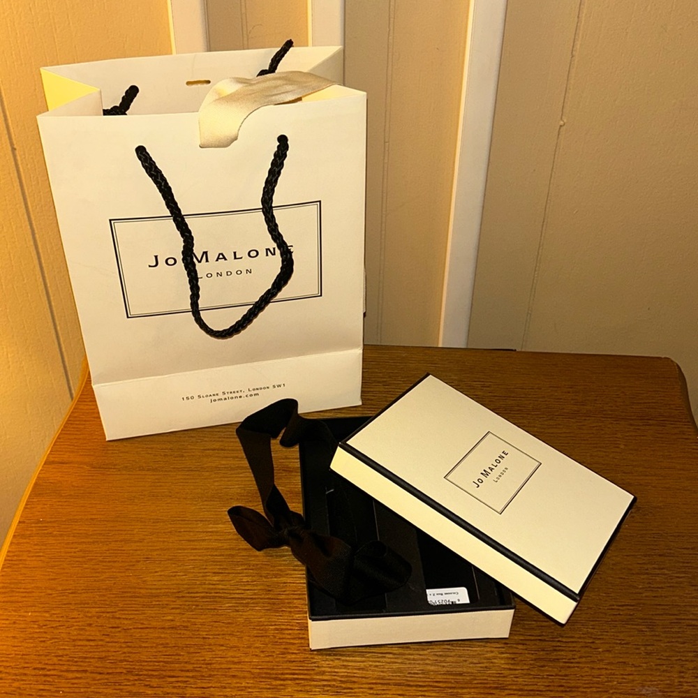 Jo Malone box, gift bag and ribbons.